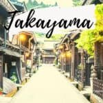 Rue traditionnelle de Takayama avec bâtiments en bois et lanternes.